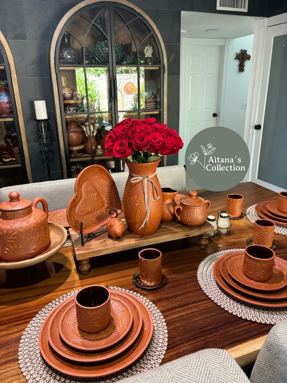 Engraved barro table setting with red roses at Aitana's Collection